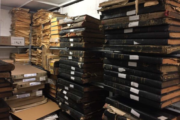 Stacks of newspaper volumes in the depot of the Irish Newspaper Archives